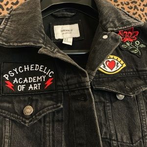 Distressed Black denim jacket with patches